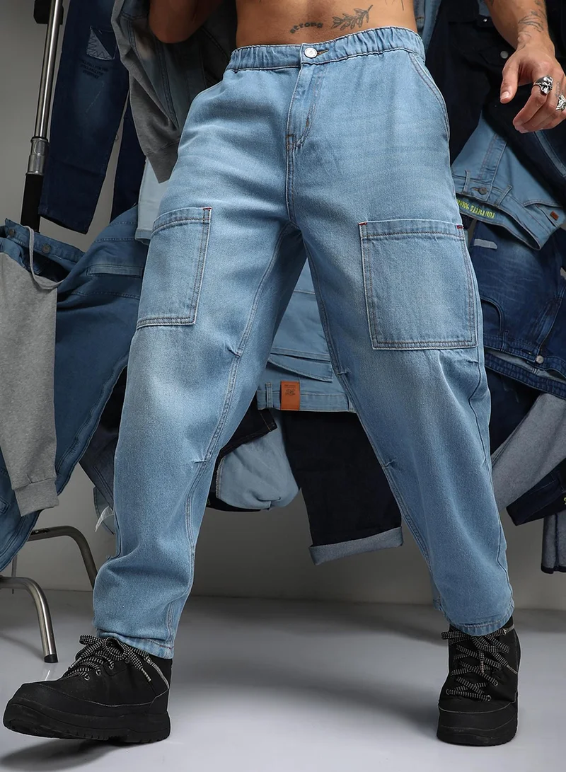 Campus Sutra Men's Light Blue Carrot-Fit Utility Denim Jeans For Casual Wear | Low-Waist | Light-Wash | Button & Zip Closure | Denim Jeans Crafted With Comfort Wear For Everyday Wear