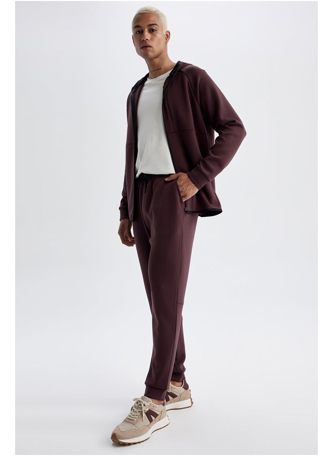 بنطال رياضي محبوك بقصّة Slim Fit للرجال