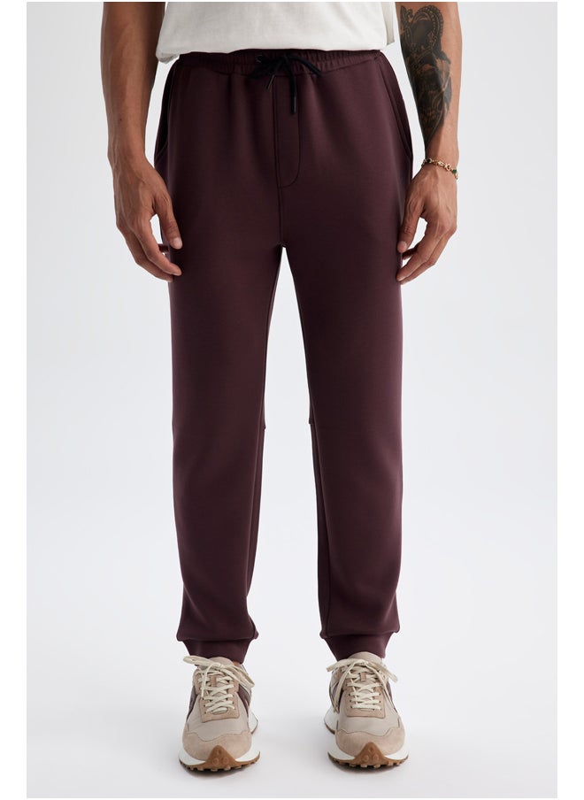 بنطال رياضي محبوك بقصّة Slim Fit للرجال