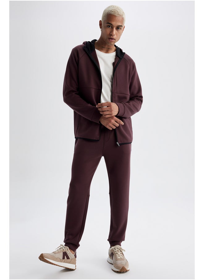 بنطال رياضي محبوك بقصّة Slim Fit للرجال
