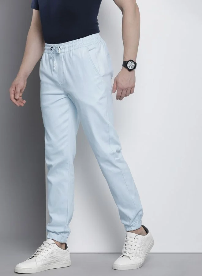 شركة المرآب الهندية Men Slim Fit Solid Mid-Rise Stretchable Chino Joggers