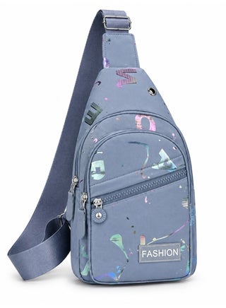 Girls' crossbody bag with a modern design and multiple zippers – blue with glittery patterns – lightweight and practical for everyday use