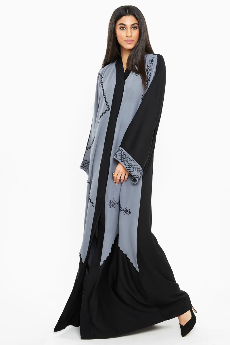 النخبة A classy grey abaya with black embroidery detailing.-AJ140A