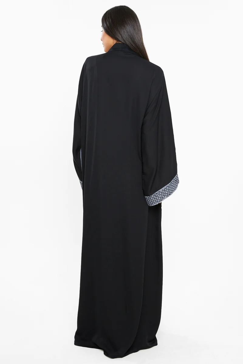 النخبة A classy grey abaya with black embroidery detailing.-AJ140A