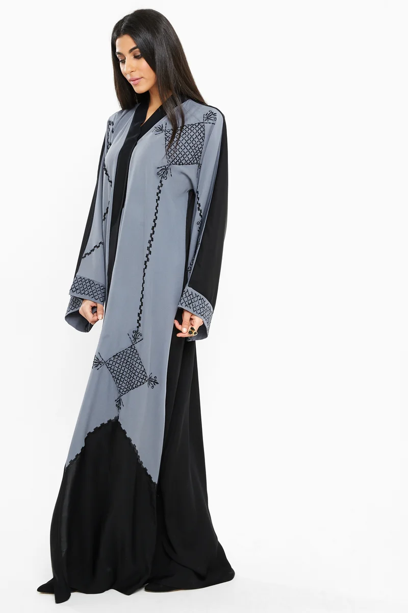 النخبة A classy grey abaya with black embroidery detailing.-AJ140A