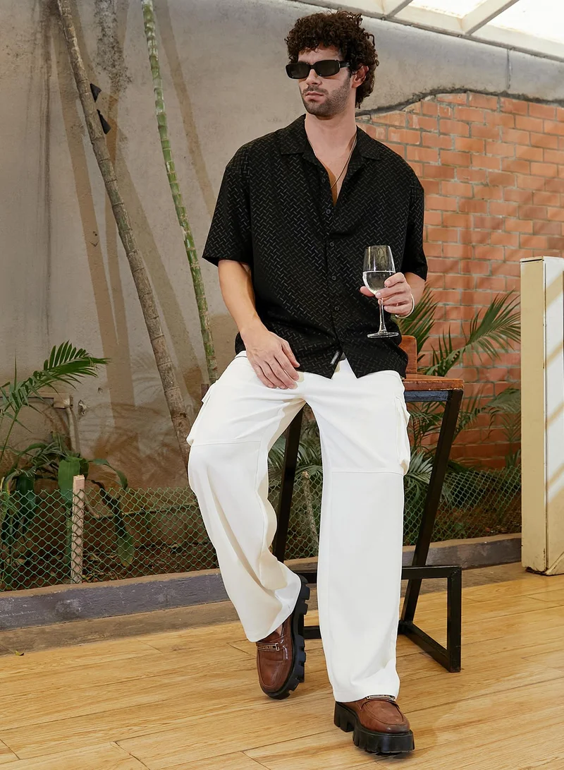 Campus Sutra Campus Sutra Men's Onyx Black Marquise-Imprint Oversized Shirt For Casual Wear | Cuban Collar | Short Regular Sleeves | Button Closure | Oversized Shirt Crafted With Comfort Fit For Everyday Wear