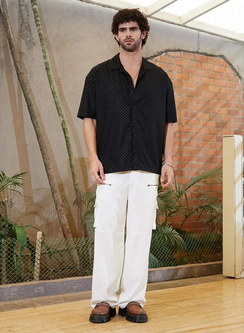 Campus Sutra Campus Sutra Men's Onyx Black Marquise-Imprint Oversized Shirt For Casual Wear | Cuban Collar | Short Regular Sleeves | Button Closure | Oversized Shirt Crafted With Comfort Fit For Everyday Wear