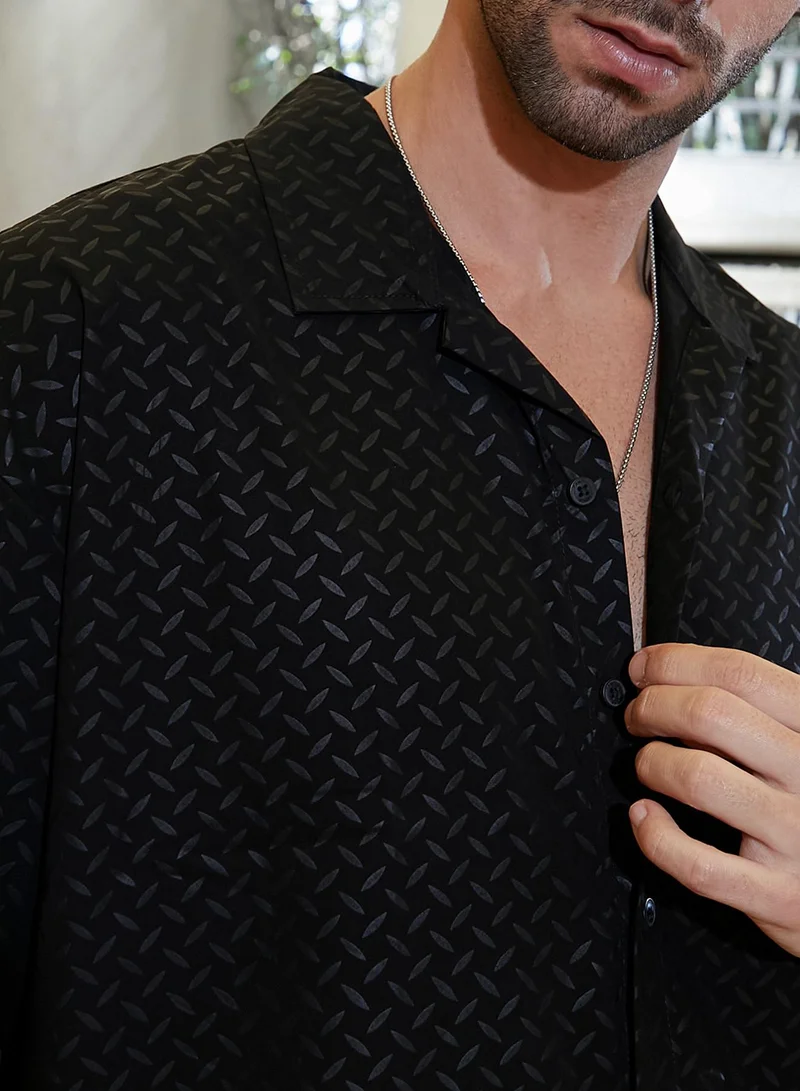 Campus Sutra Campus Sutra Men's Onyx Black Marquise-Imprint Oversized Shirt For Casual Wear | Cuban Collar | Short Regular Sleeves | Button Closure | Oversized Shirt Crafted With Comfort Fit For Everyday Wear