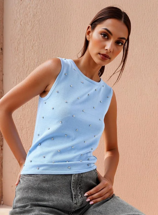 ايكونيك توب بدون أكمام مزين بمسامير أيقونية