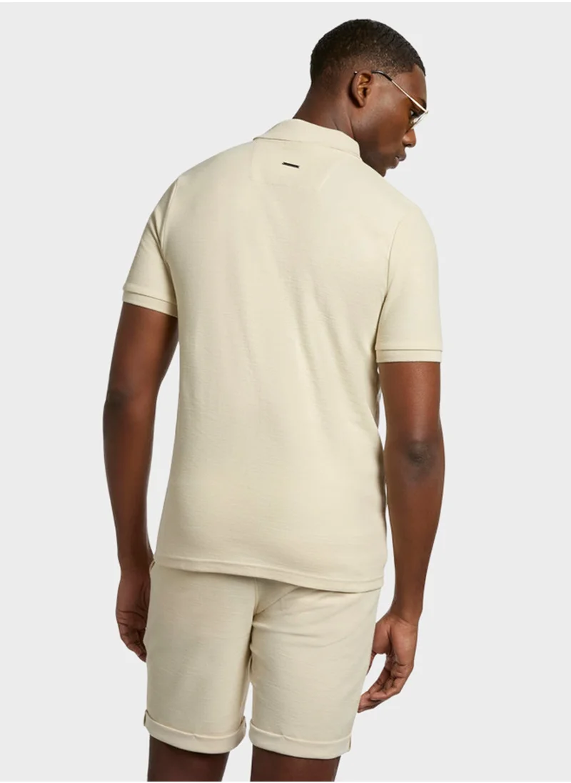 NAUTICA Men's Beige Short Sleeve Zip Polo Shirt, Stylish Lightweight Knit for Sophisticated Summer Style