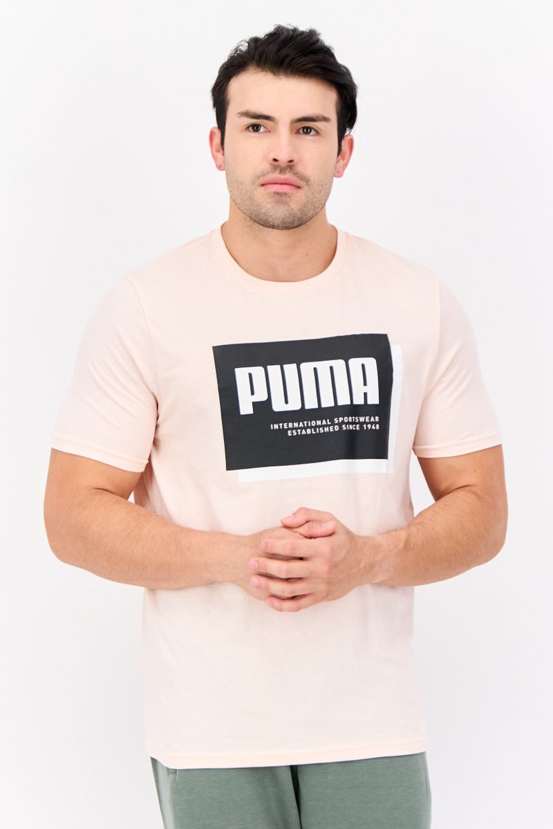 PUMA Men Sportswear Fit Short Sleeve Outdoor T-Shit, Pink - Image 1