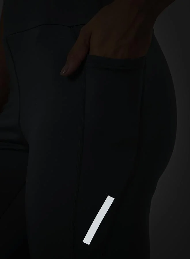 Styli Active Charcoal Reflector Striped Pocket Detail Calf Mesh 7/8 Leggings for Women | Best Price UAE
