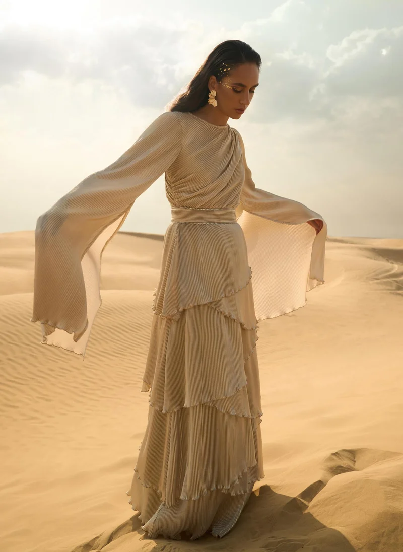 Lichi Pleated maxi dress with layered skirt and rhinestone decor at the waist
