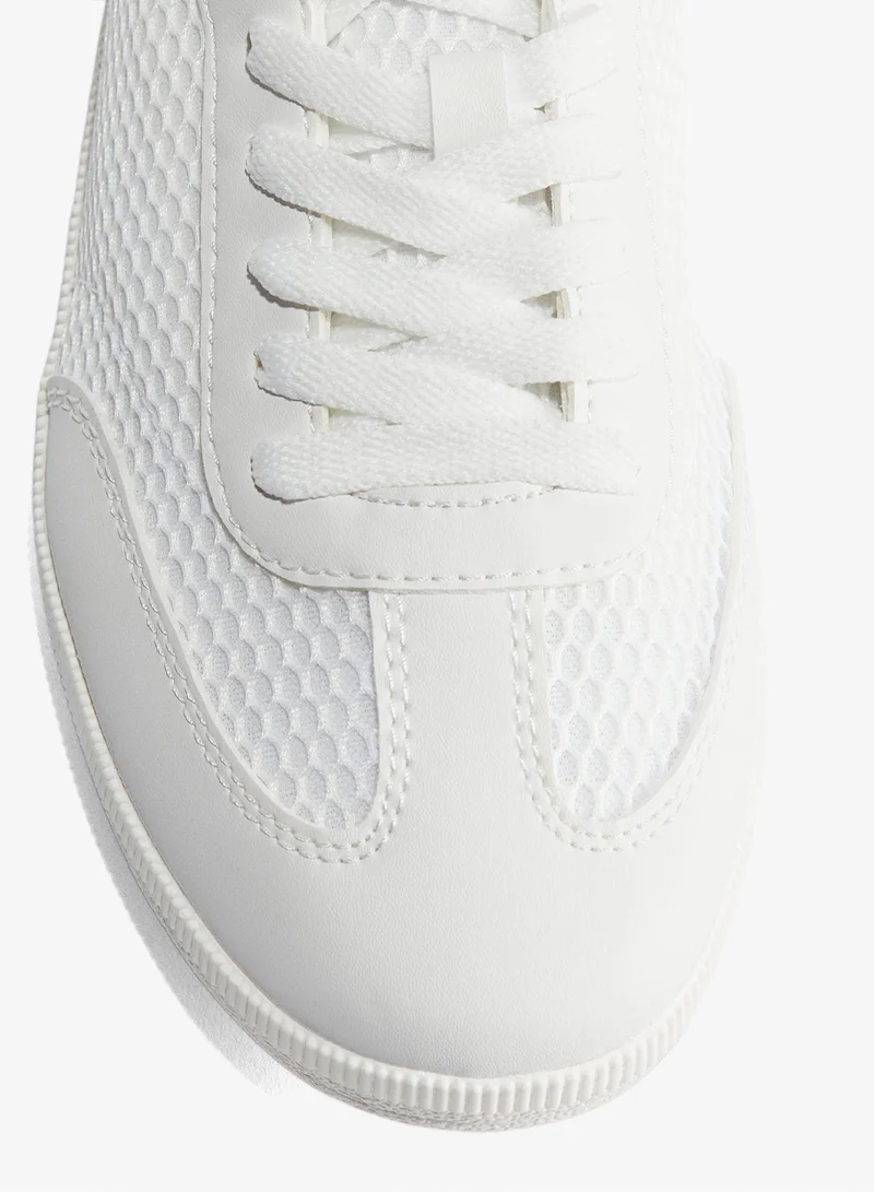 اتش اند ام حذاء رياضي