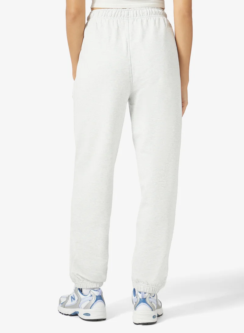 New Balance ASH HEATHER (AHH) Varsity French Terry Joggers for Women | Best Price UAE