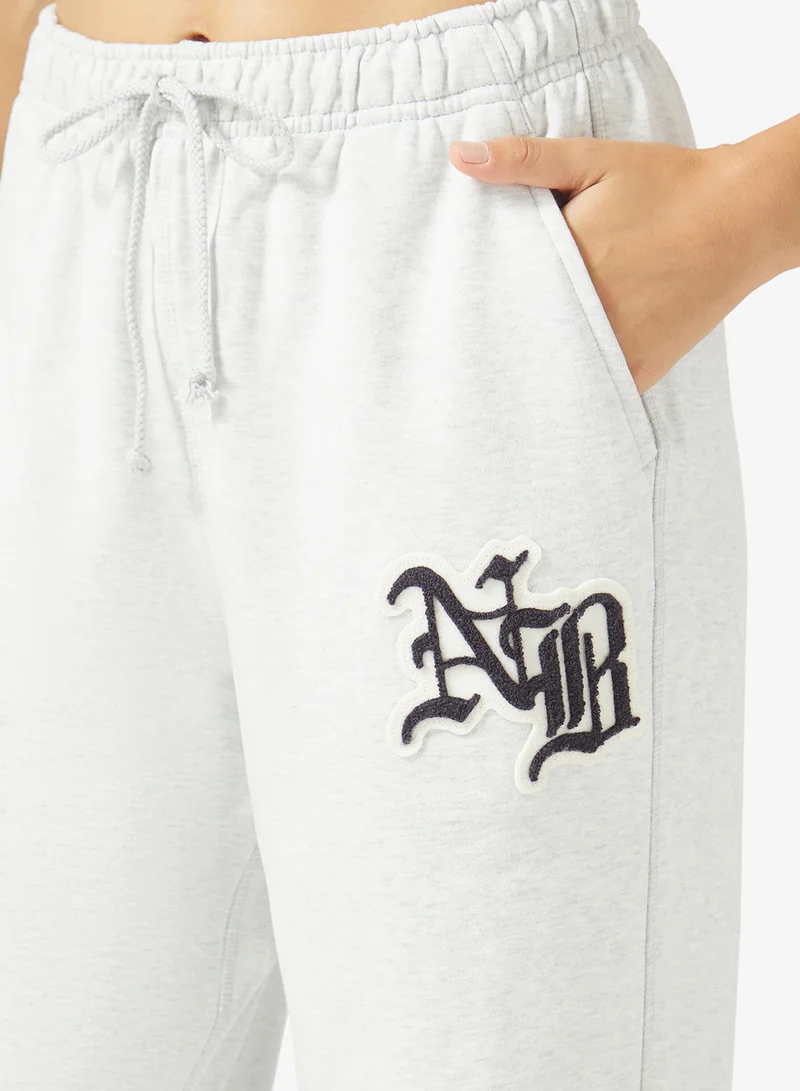New Balance ASH HEATHER (AHH) Varsity French Terry Joggers for Women | Best Price UAE