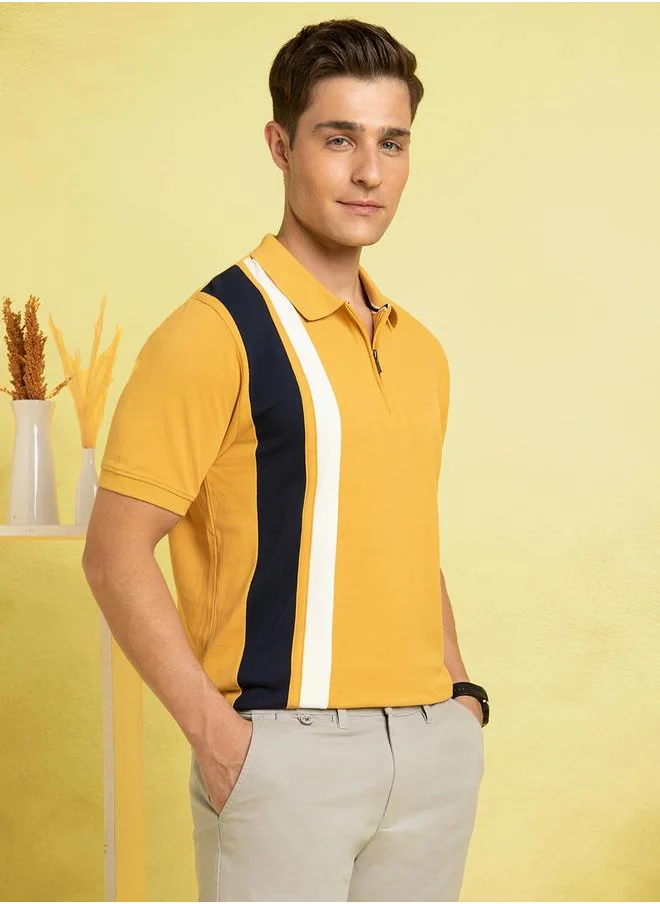 Dennis Lingo Amber Gold Striped Polo T-Shirt for Men with vertical printed stripes, tailored in a premium pique fabric for a modern and on-trend appeal.