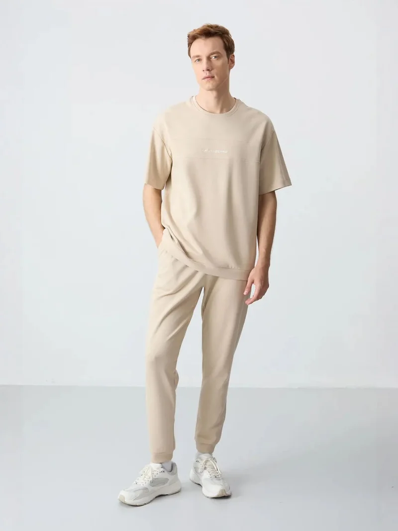 تومي لايف TOMMY Men's Oversized T-shirt And Pants Set