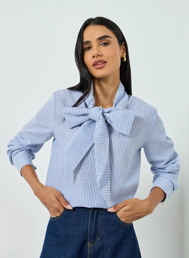 تايك تو بلوزة مخططة برباط عنق