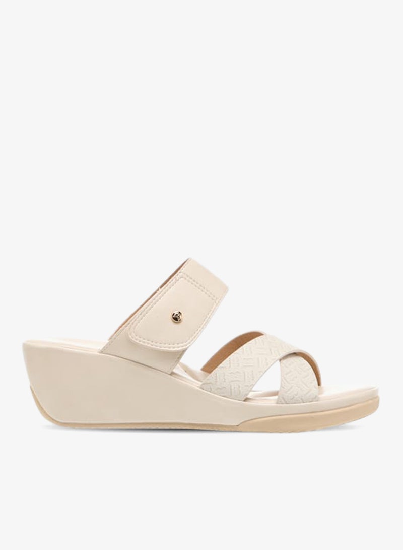 فلورا بيلا من شو إكسبرس صنادل نسائية بنعل ويدج بطبعة شعار الماركة سهلة الارتداء - Image 1