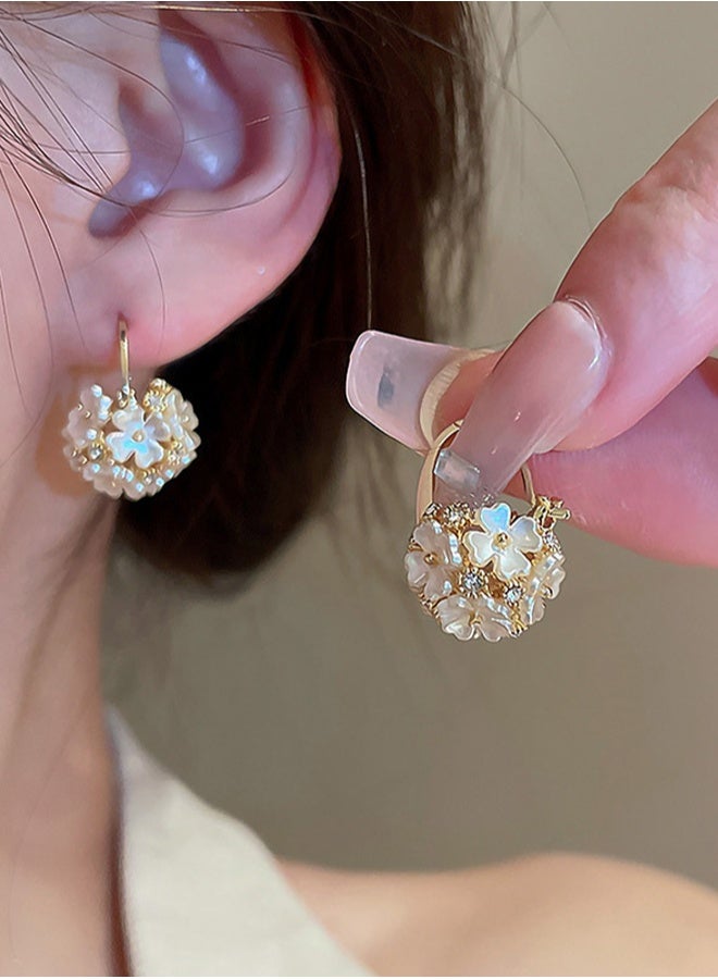 DAEVO Gold Floral Cluster Huggie Earrings for women - Image 1