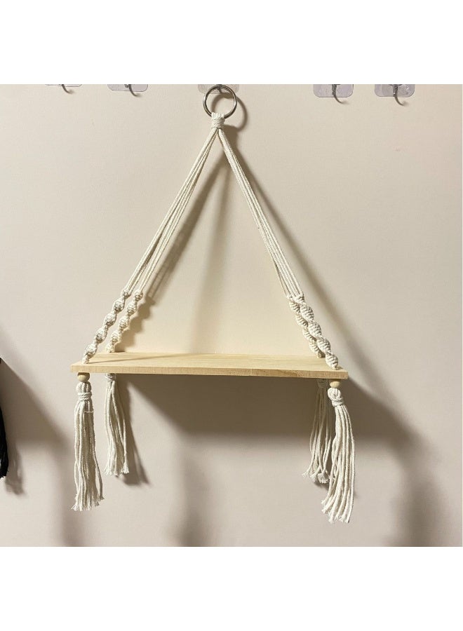 Macrame Tassel Planter Wall Shelf - Handcrafted Minimalist Decorative Hanging Piece for Home and Guesthouse Living Rooms.