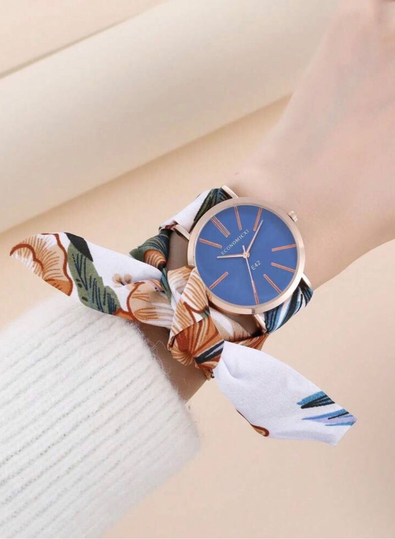 ECONOMICXI Casual Watch For Women With Colored Fabric Strap - Image 1