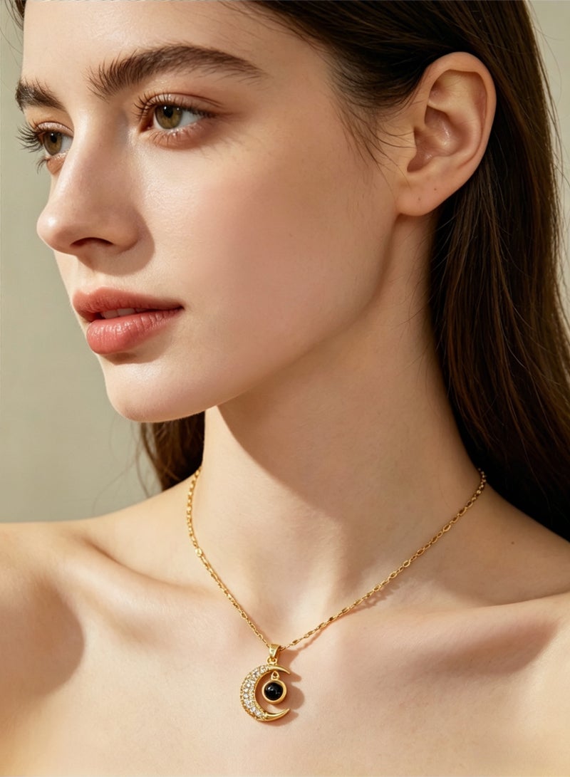 loven Golden crescent moon projection pendant necklace that projects "I love you" in 100 languages. 14K gold plated, crystal starry sky pendant, adjustable chain. Perfect as a birthday, Christmas, or anniversary gift. 18 inches. - Image 4