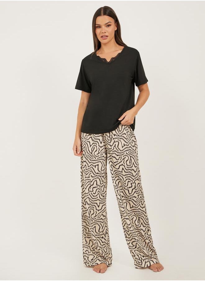 Styli Lace Trim Notch Neck T-Shirt and Printed Pyjama Pants Set  - Image 1