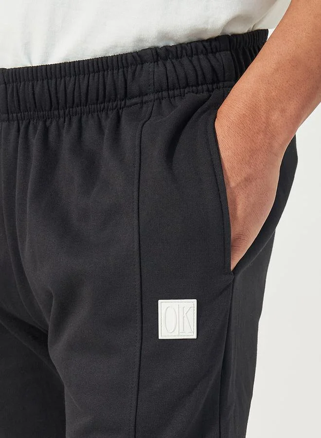 Styli Relaxed Fit Joggers with Silicon Badge Detail