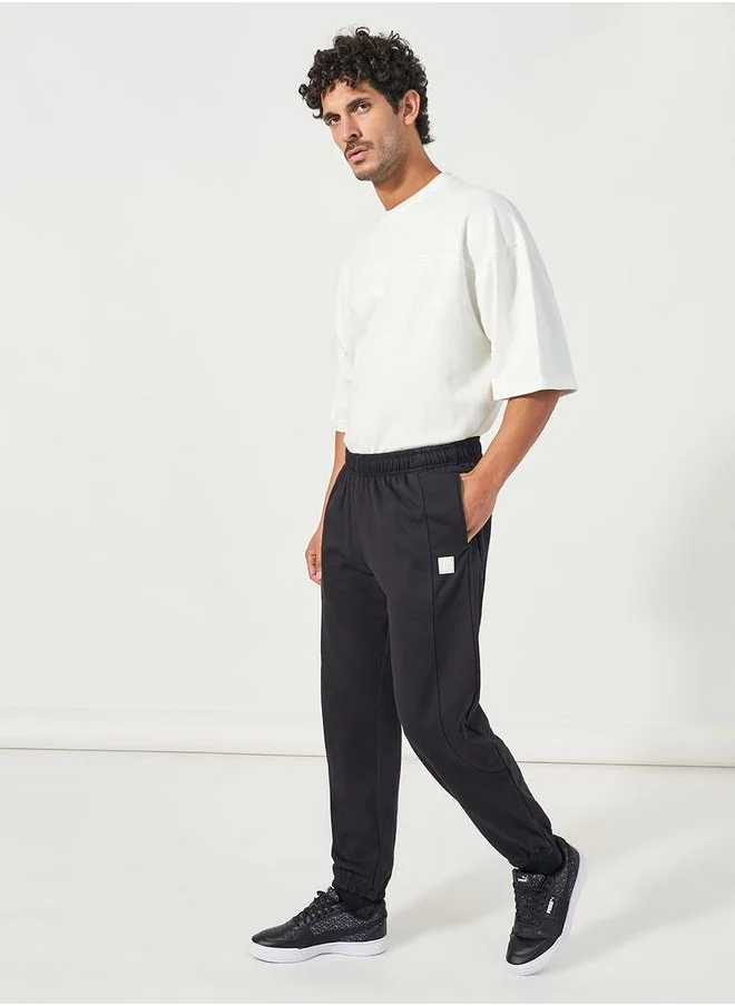 Styli Relaxed Fit Joggers with Silicon Badge Detail