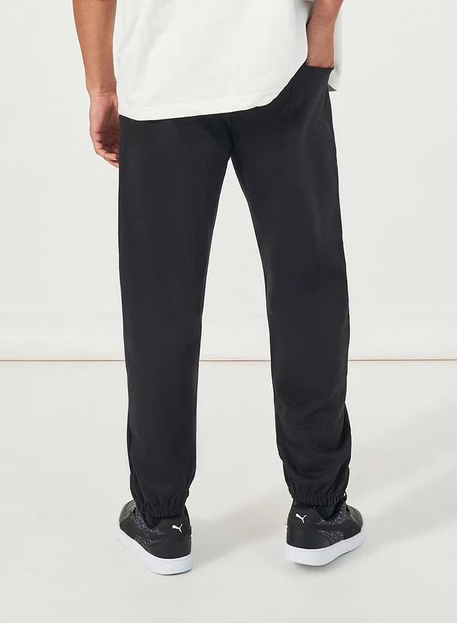 Styli Relaxed Fit Joggers with Silicon Badge Detail
