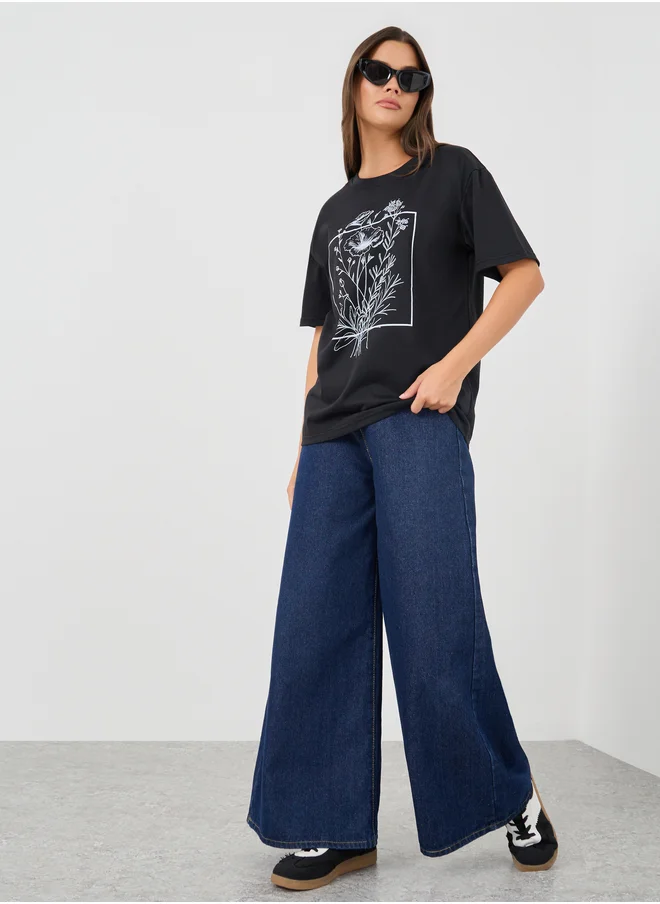 ستايلي Styli Graphic Print Round Neck T-Shirt