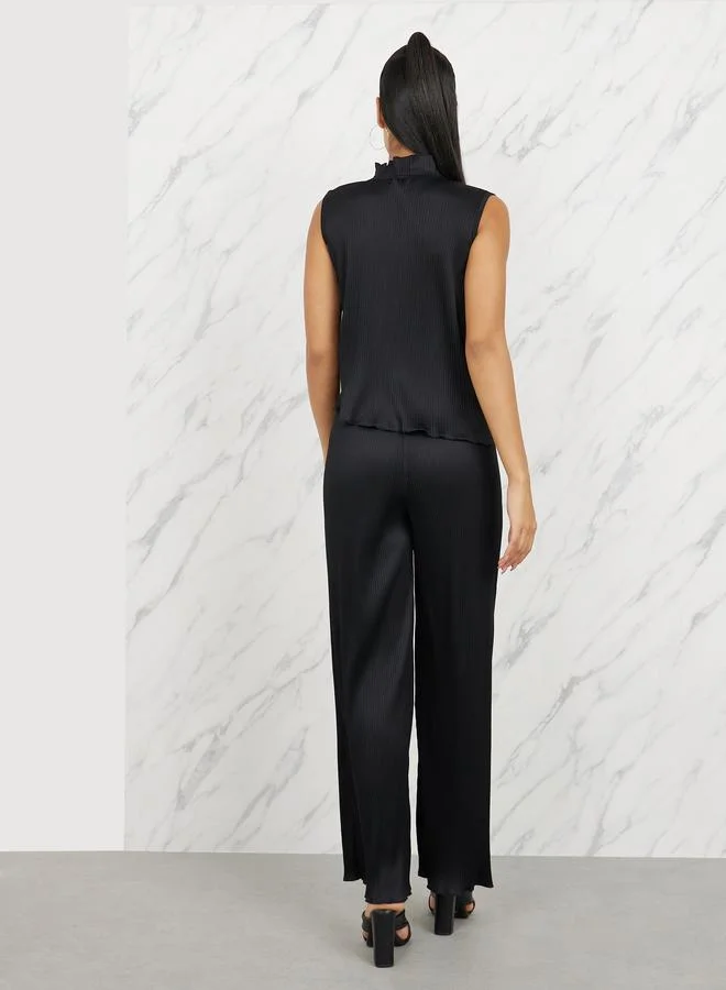 Styli Plisse Asymmetric Hem Sleeveless Top and Wide Leg Pant Set