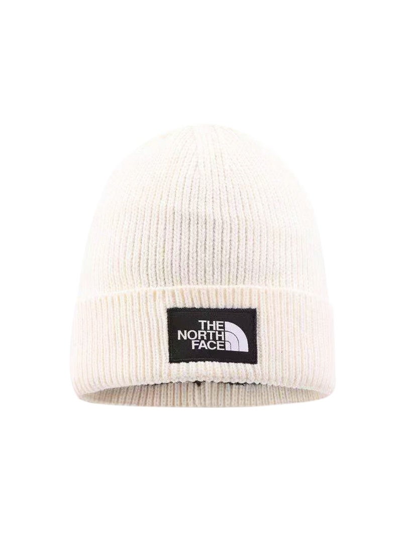 The North Face Cream Ribbed Beanie – Chic Warm Winter Hat with Bold Brand Logo 577Size