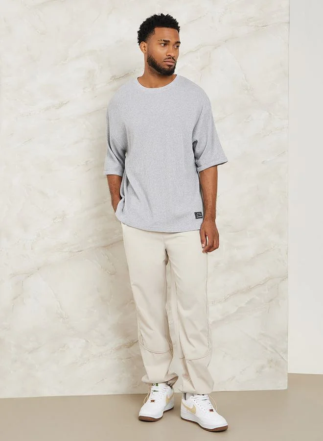 Styli Waffle Knit Oversized T-Shirt with Turn Up Sleeve
