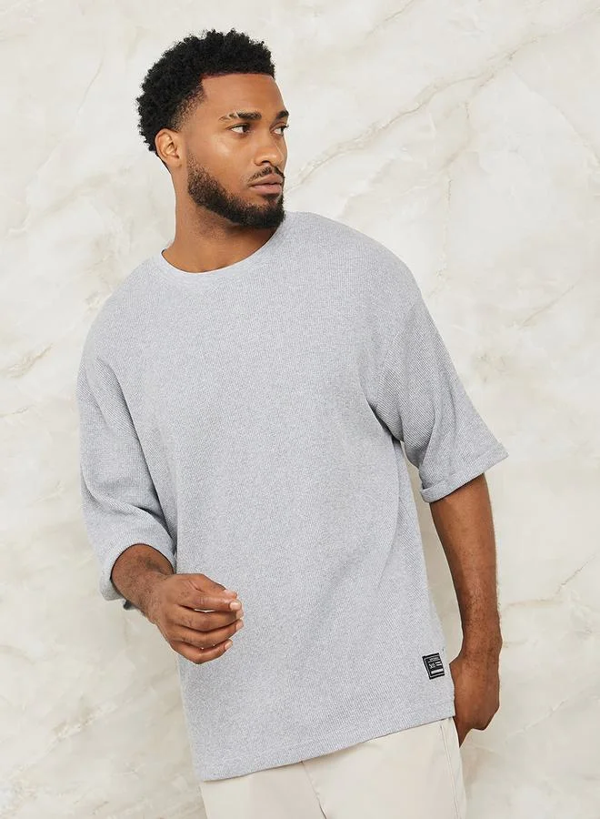 Styli Waffle Knit Oversized T-Shirt with Turn Up Sleeve