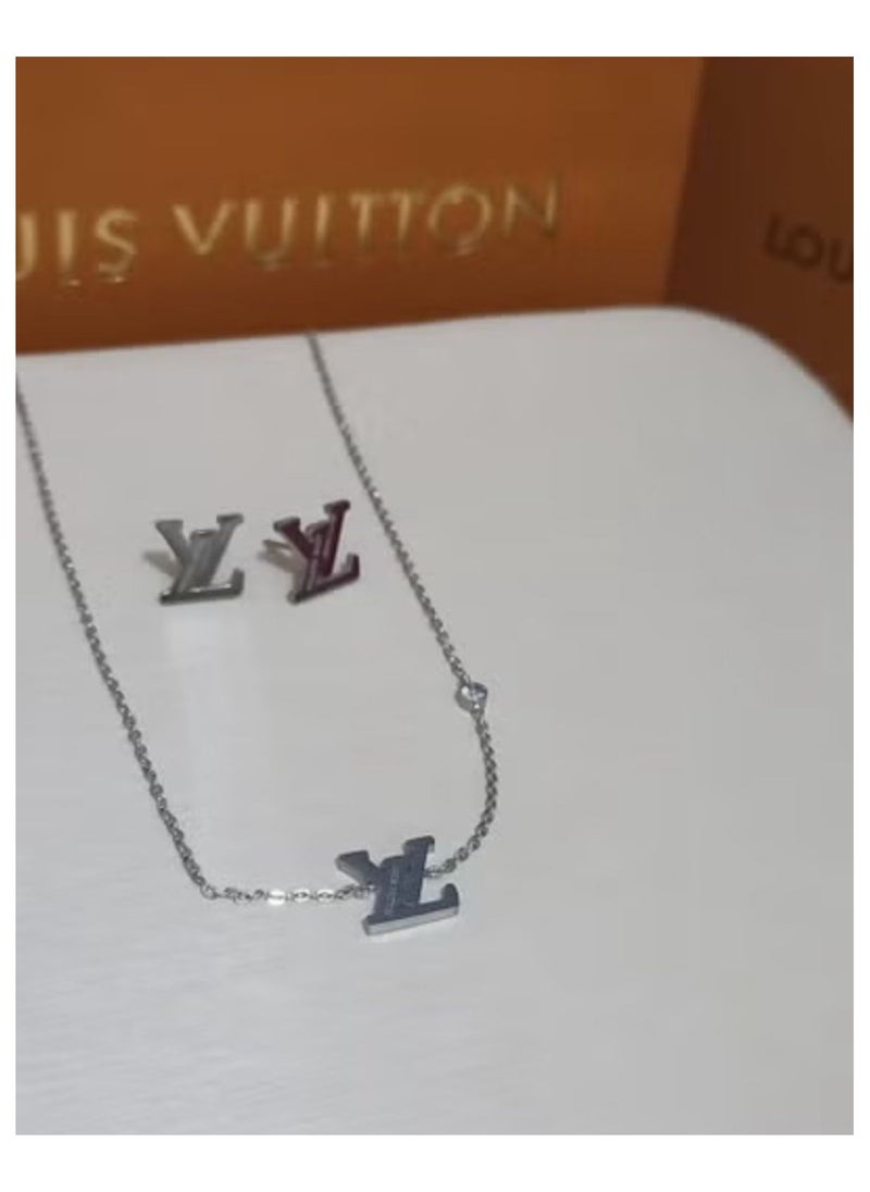 Lo Silver necklace and earring set with accessories and warranty card 