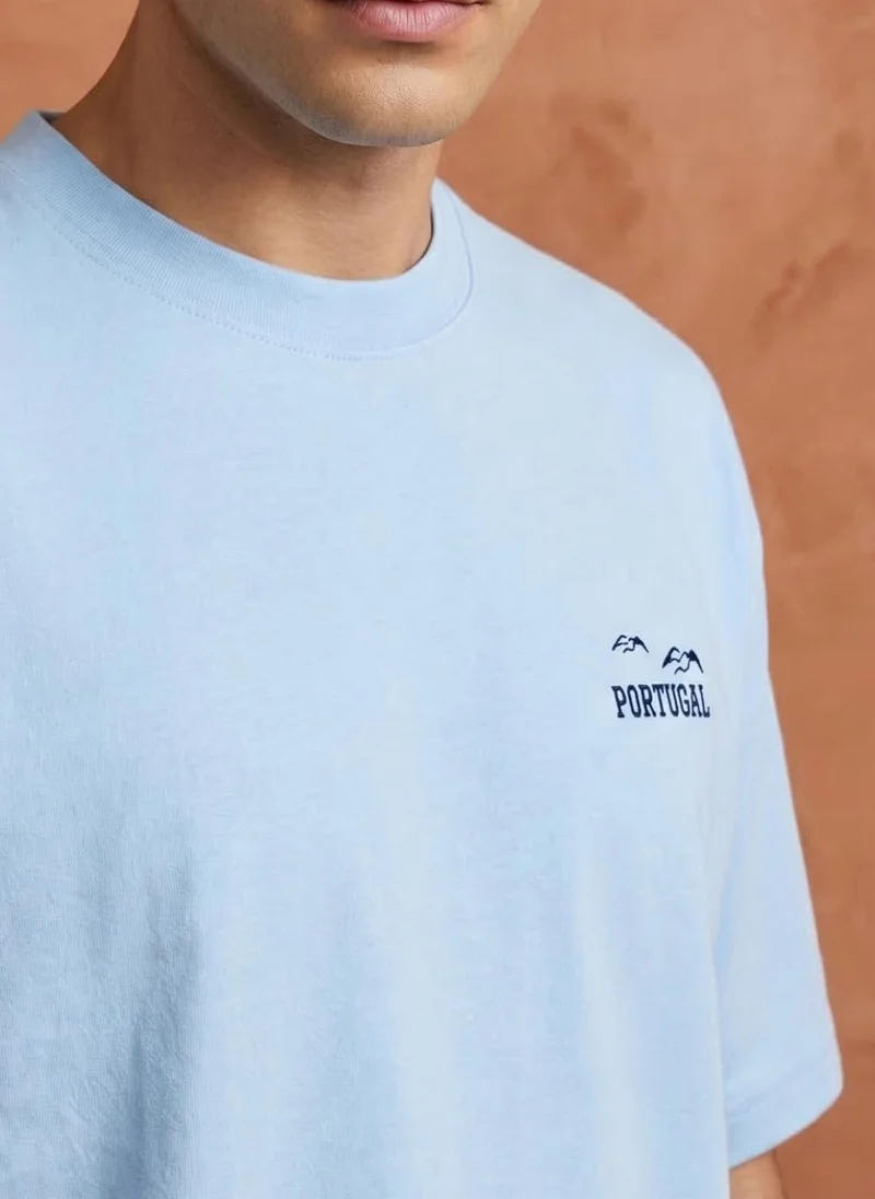 NOBERO Powder Blue Men Oversized Graphic Printed T-shirt for Men | Best Price UAE