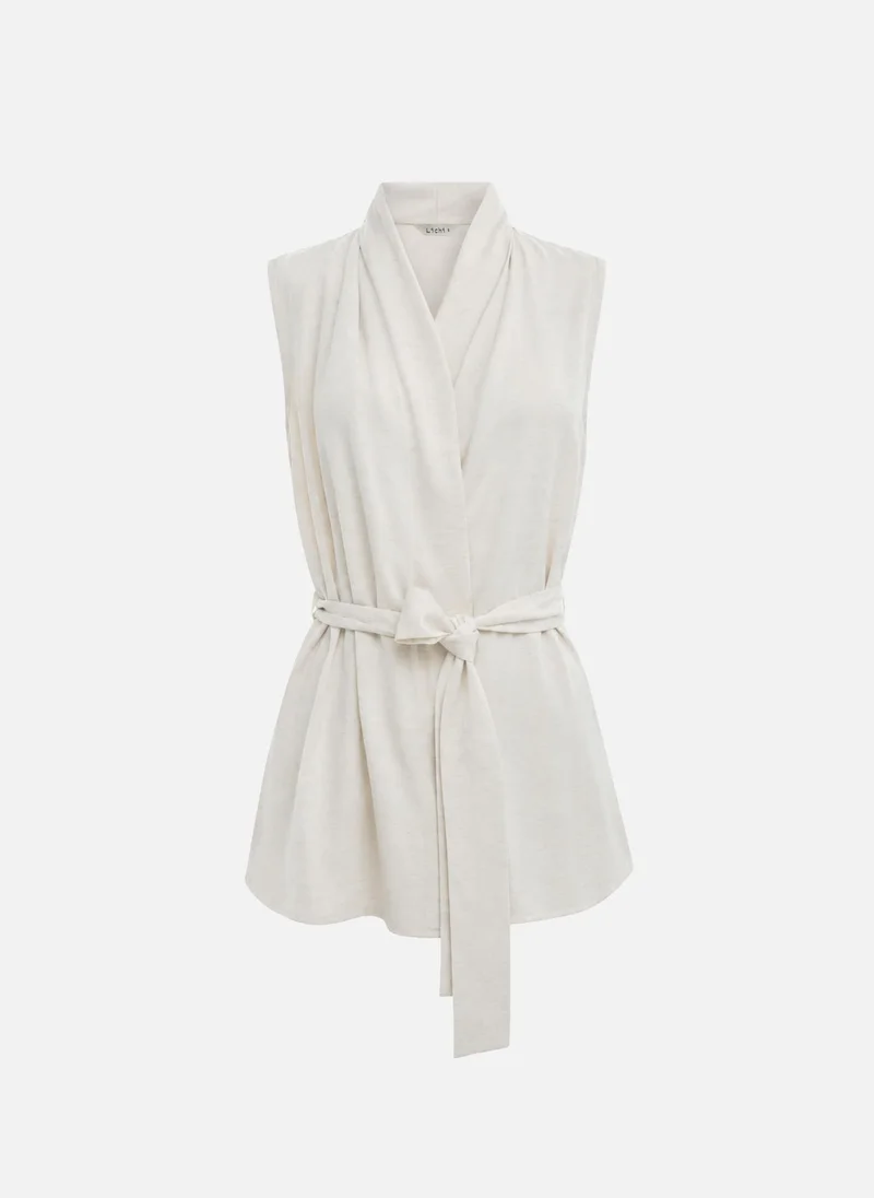 Lichi Wrap waistcoat with a wide belt