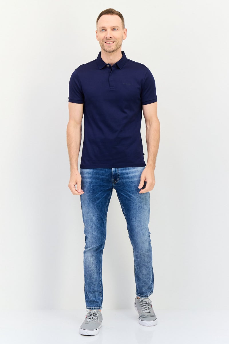 Levi's تي شيرت بولو بأكمام قصيرة للرجال بتصميم عادي مع شعار العلامة التجارية، أزرق داكن - Image 4