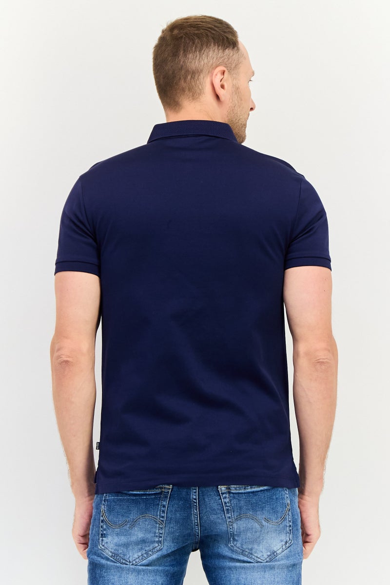 Levi's تي شيرت بولو بأكمام قصيرة للرجال بتصميم عادي مع شعار العلامة التجارية، أزرق داكن - Image 3