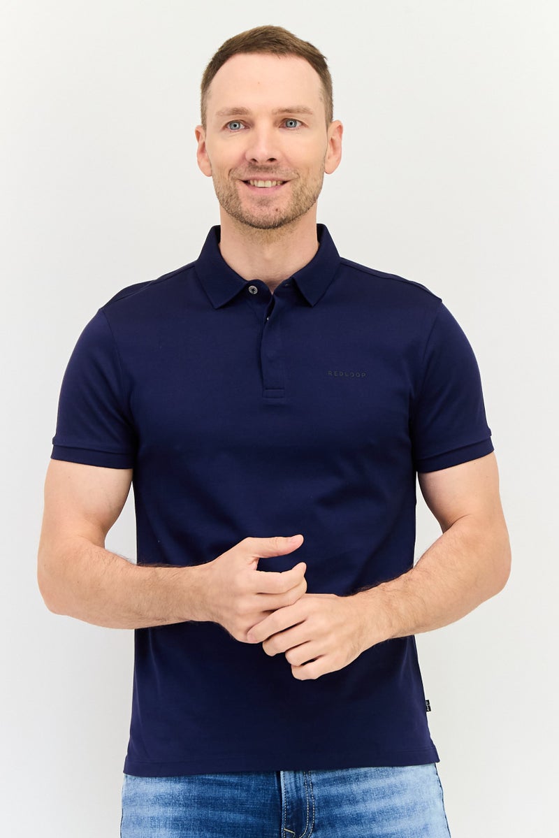 Levi's تي شيرت بولو بأكمام قصيرة للرجال بتصميم عادي مع شعار العلامة التجارية، أزرق داكن - Image 1