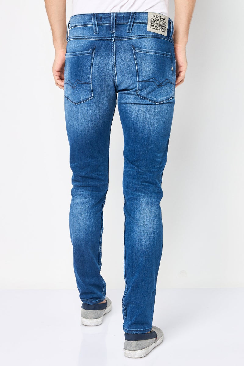 Replay جينز ضيق للرجال بتصميم مغسول وقابل للتمدد، أزرق متوسط - Image 4