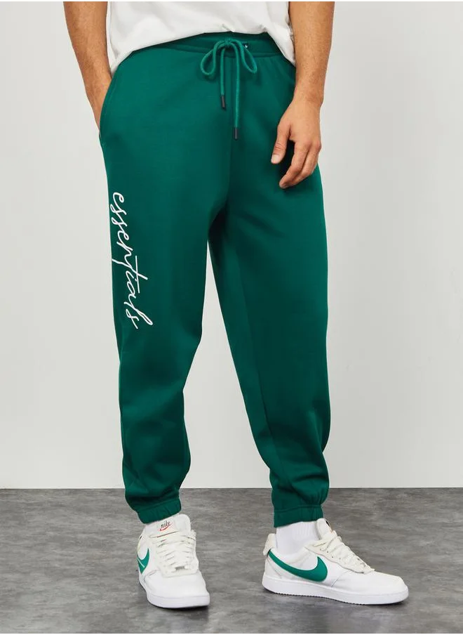 Styli Slogan Print Oversized Fit Jogger with Slip Pocket