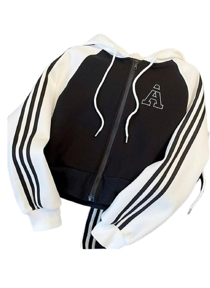 MANIKAN - Jacket a sleek black color with contrasting white sleeves, adorned with three white stripes running down the length of the arms - Image 1
