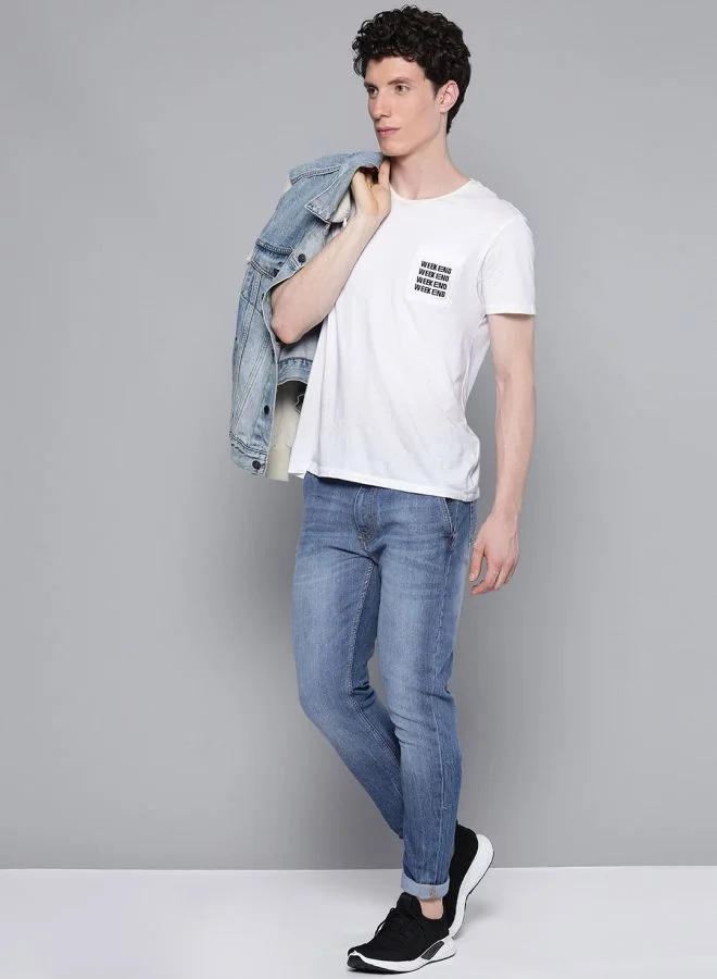 شركة المرآب الهندية Men Slim Fit Solid Mid-Rise Stretchable Jeans