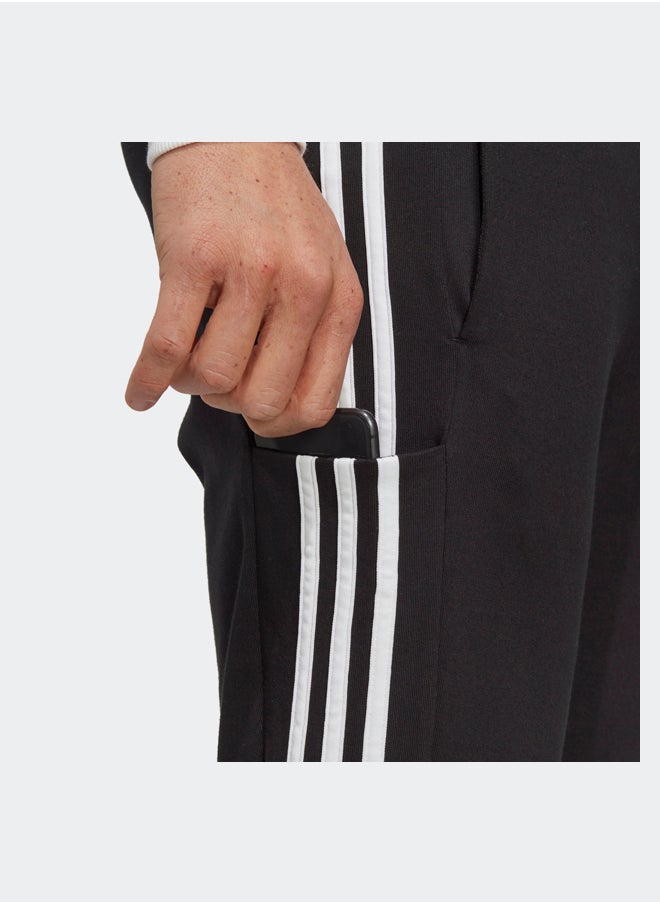 بنطلون رياضي Essentials Single Jersey بفتحة مدببة وثلاثة خطوط