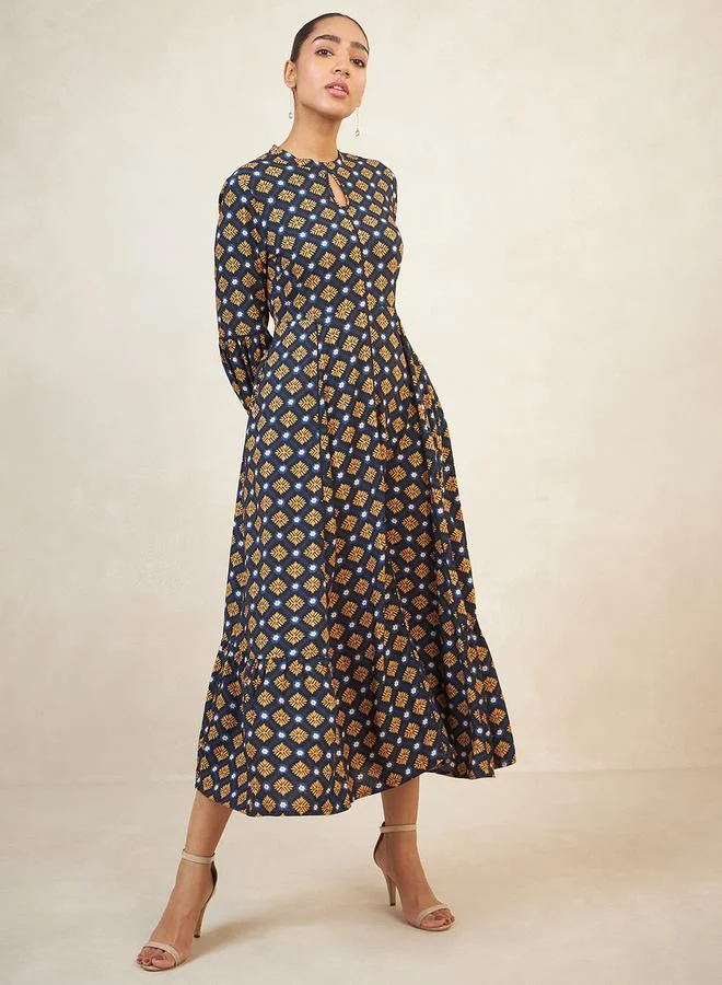 فيميلا Geo Print Keyhole Neck A-Line Maxi Dress by Styli