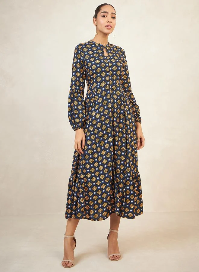 فيميلا Geo Print Keyhole Neck A-Line Maxi Dress by Styli